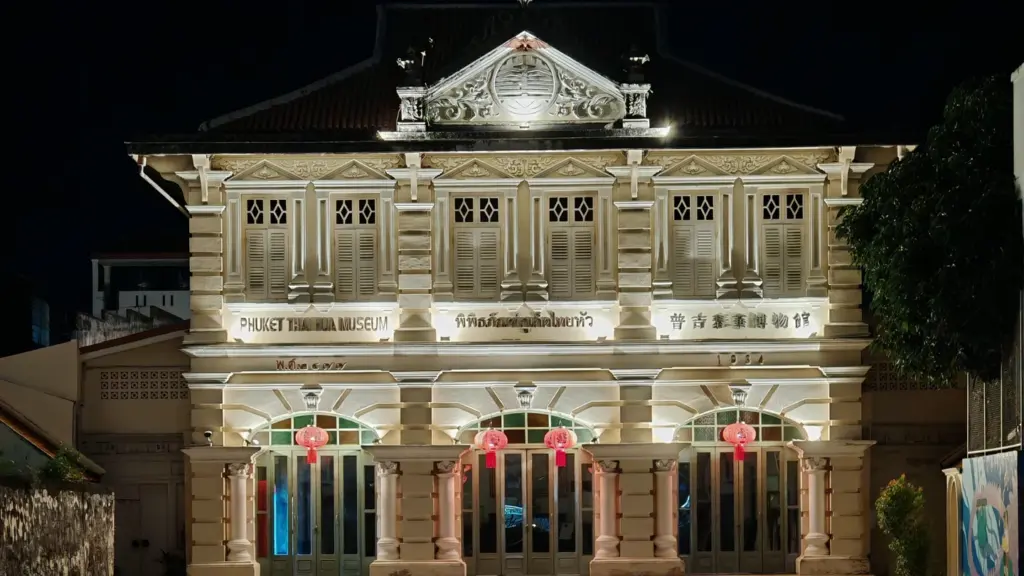 Illuminated Phuket Thai Hua Museum building in Phuket Old Town at night