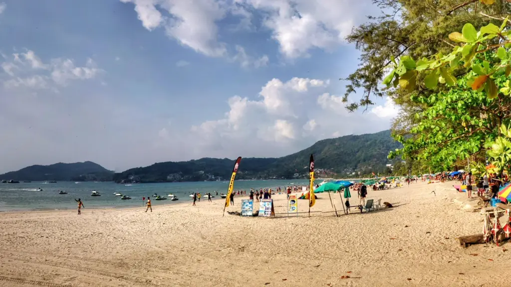Panoramic view of Patong Beach with sand, sea and waterfront buildings